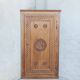 Corner cabinet in carved walnut, Savoyard style.