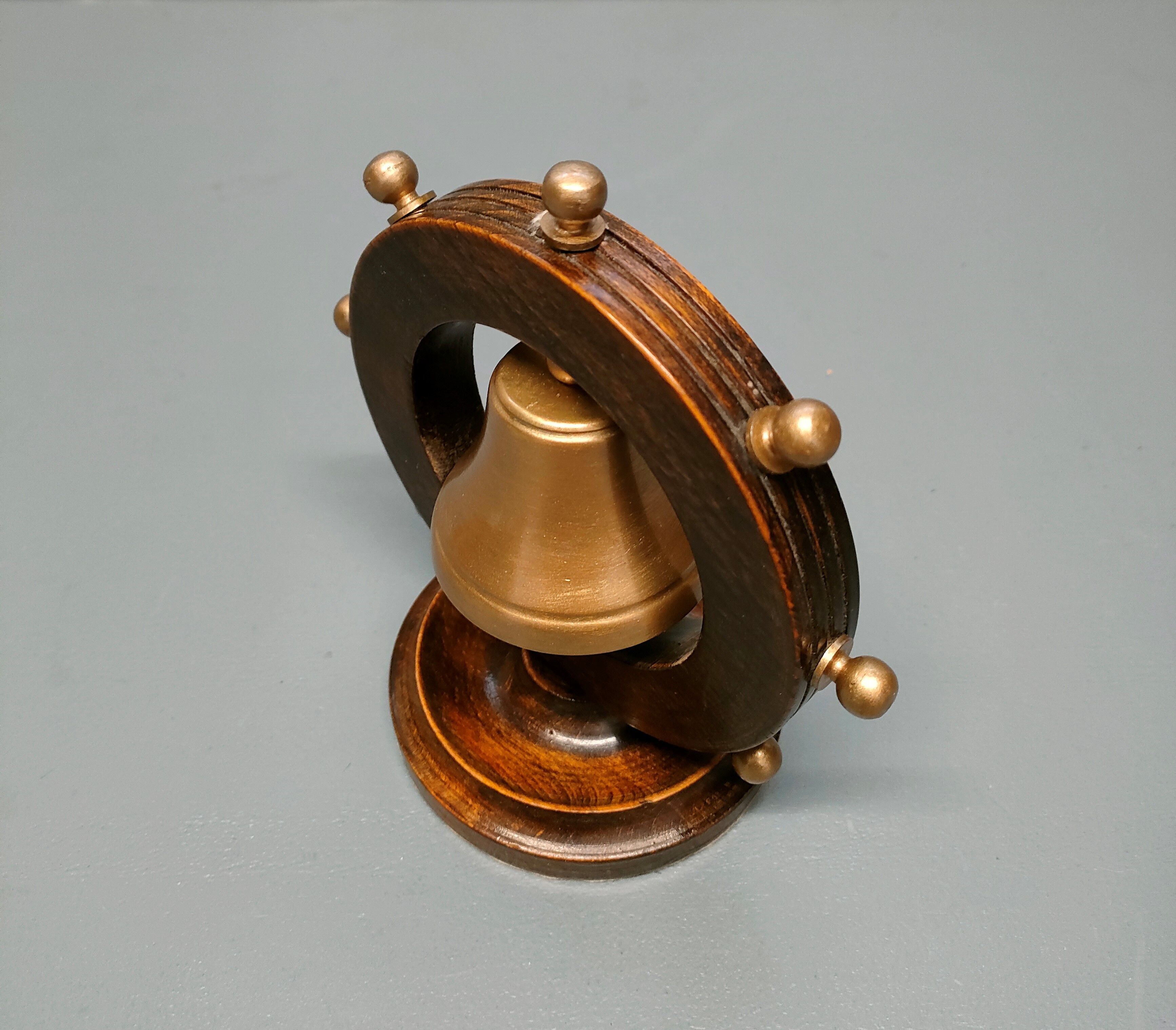 Ship's bell mounted on bar 1950s 60s