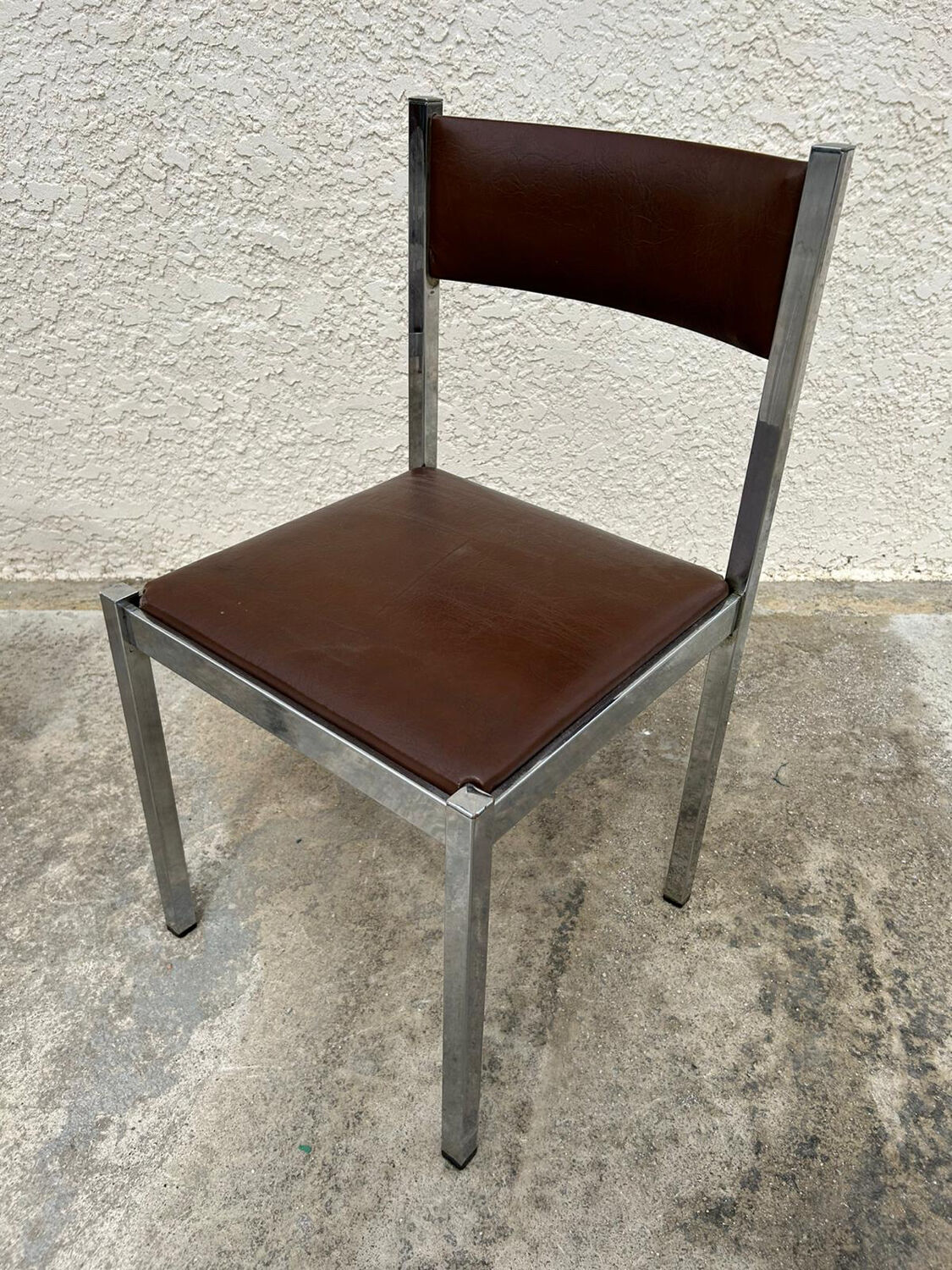 4 vintage leather/iron chairs