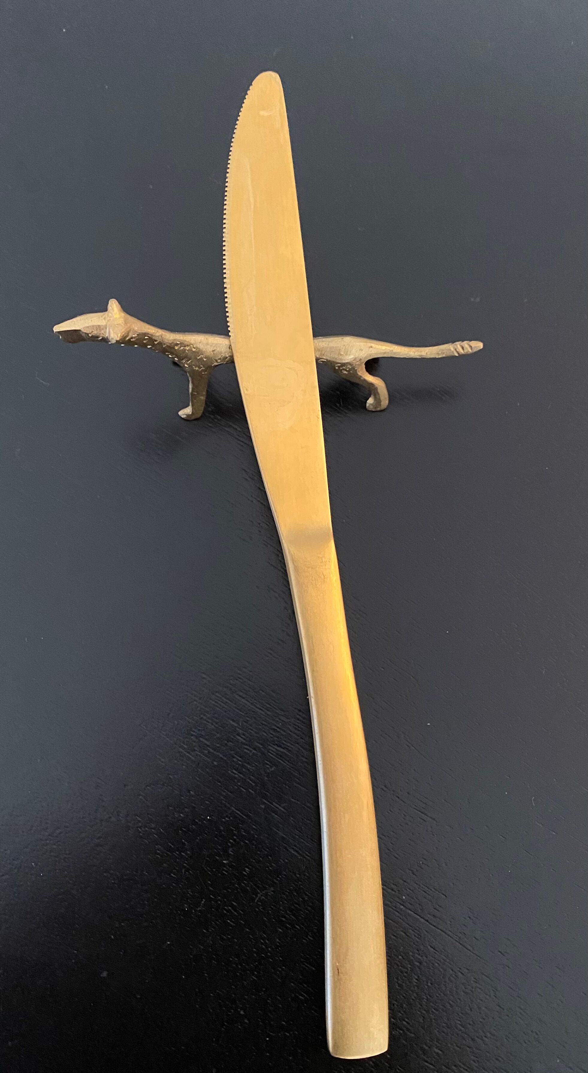 6 lioness-shaped brass knife holders