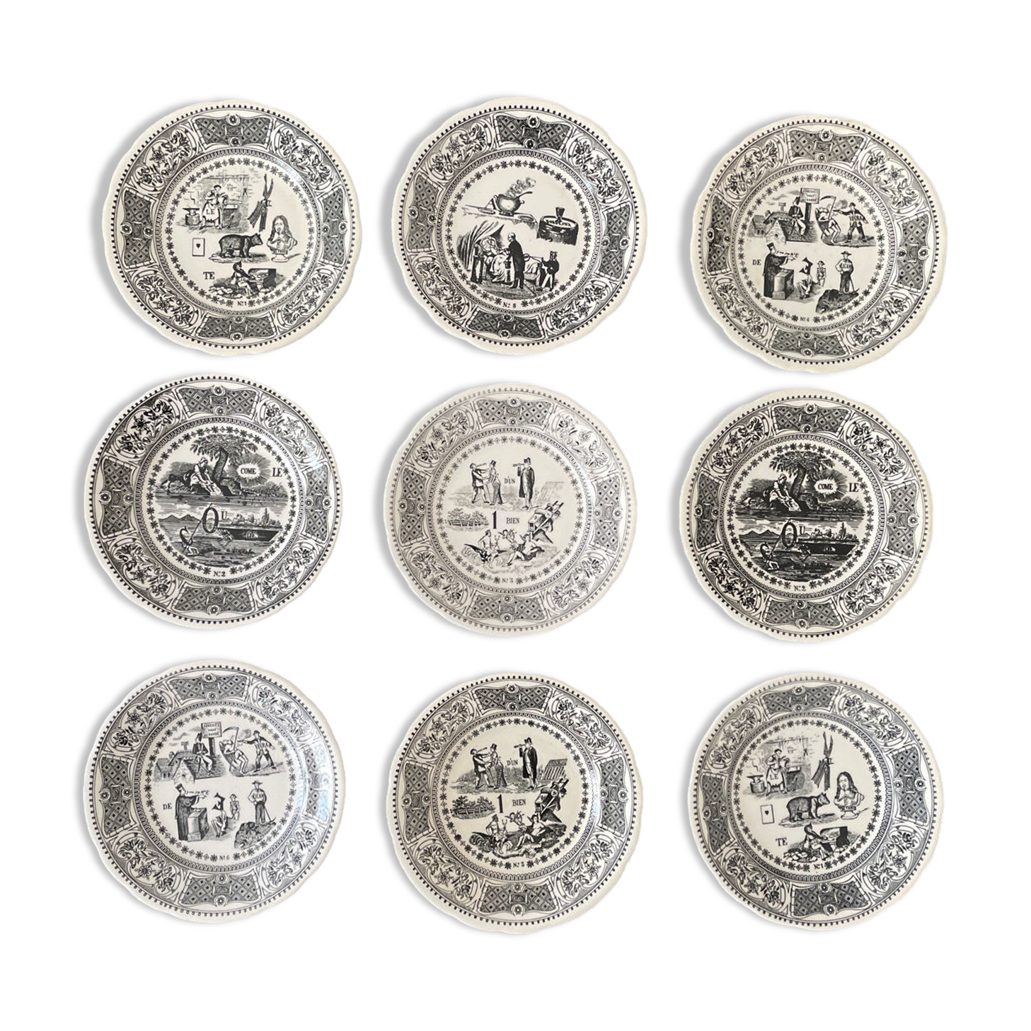 Set of 9 plates Gien "rebus".