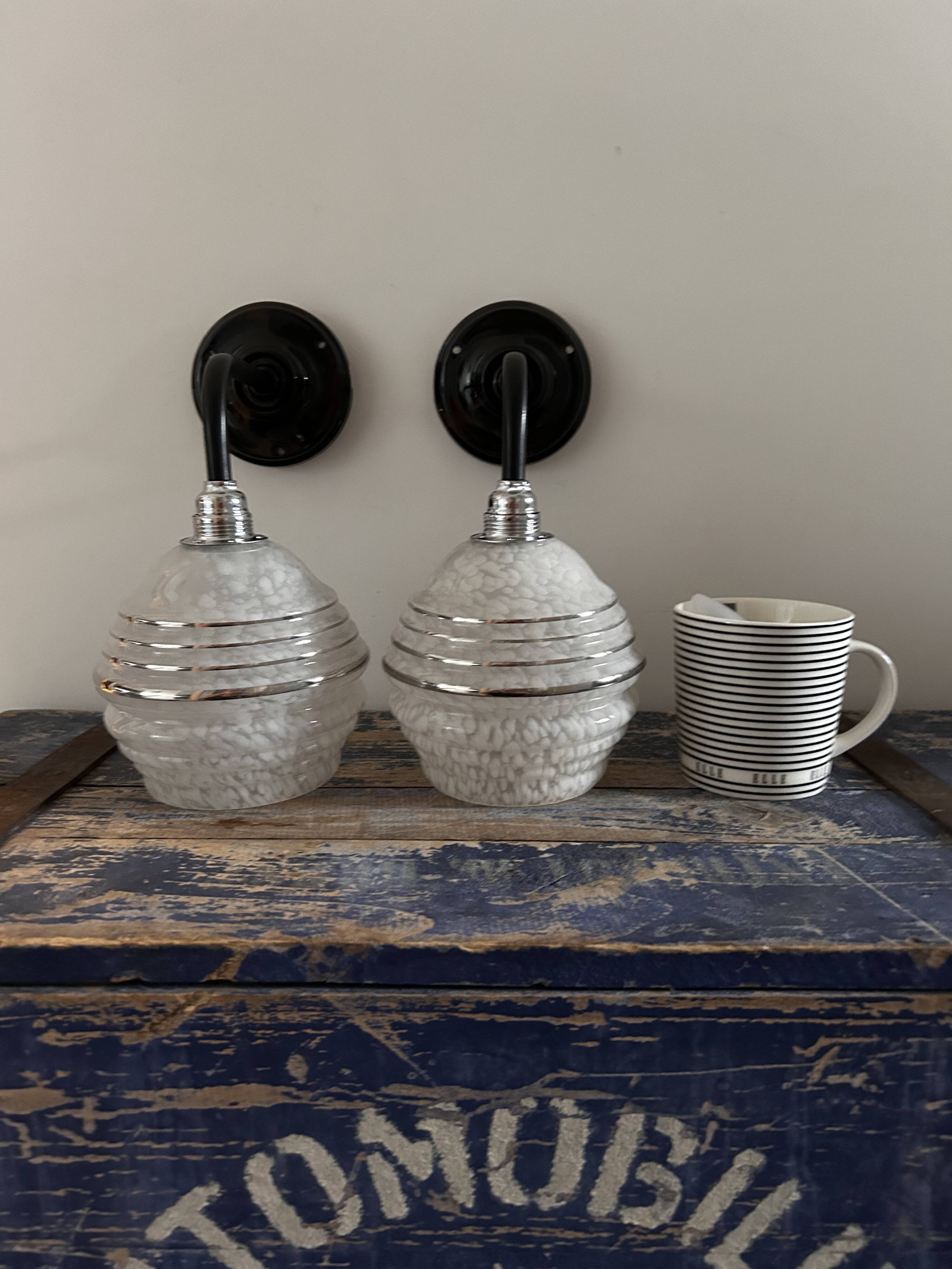 Pair of white, black and silver Art Deco wall lights