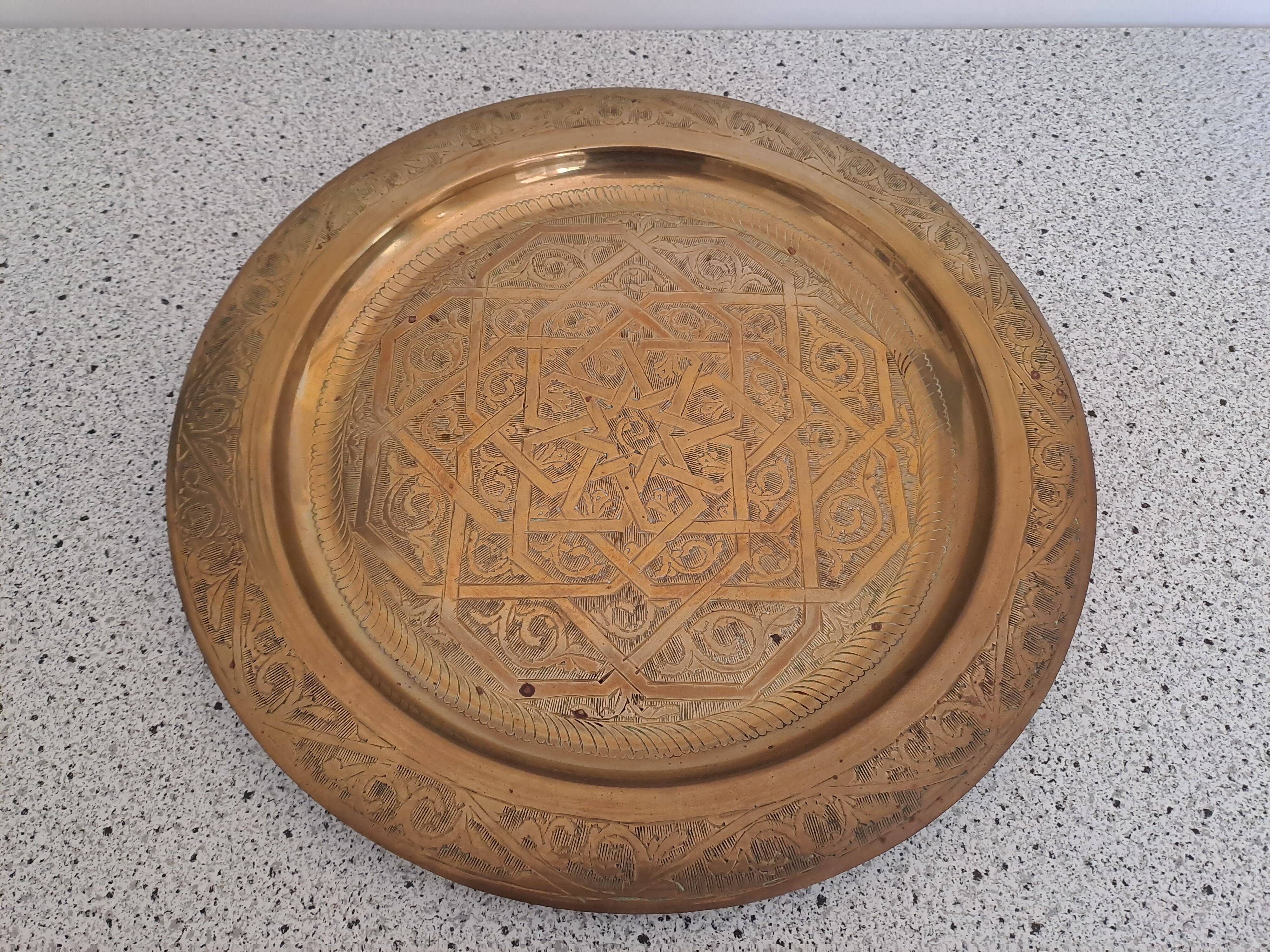 Large chiseled metal plate