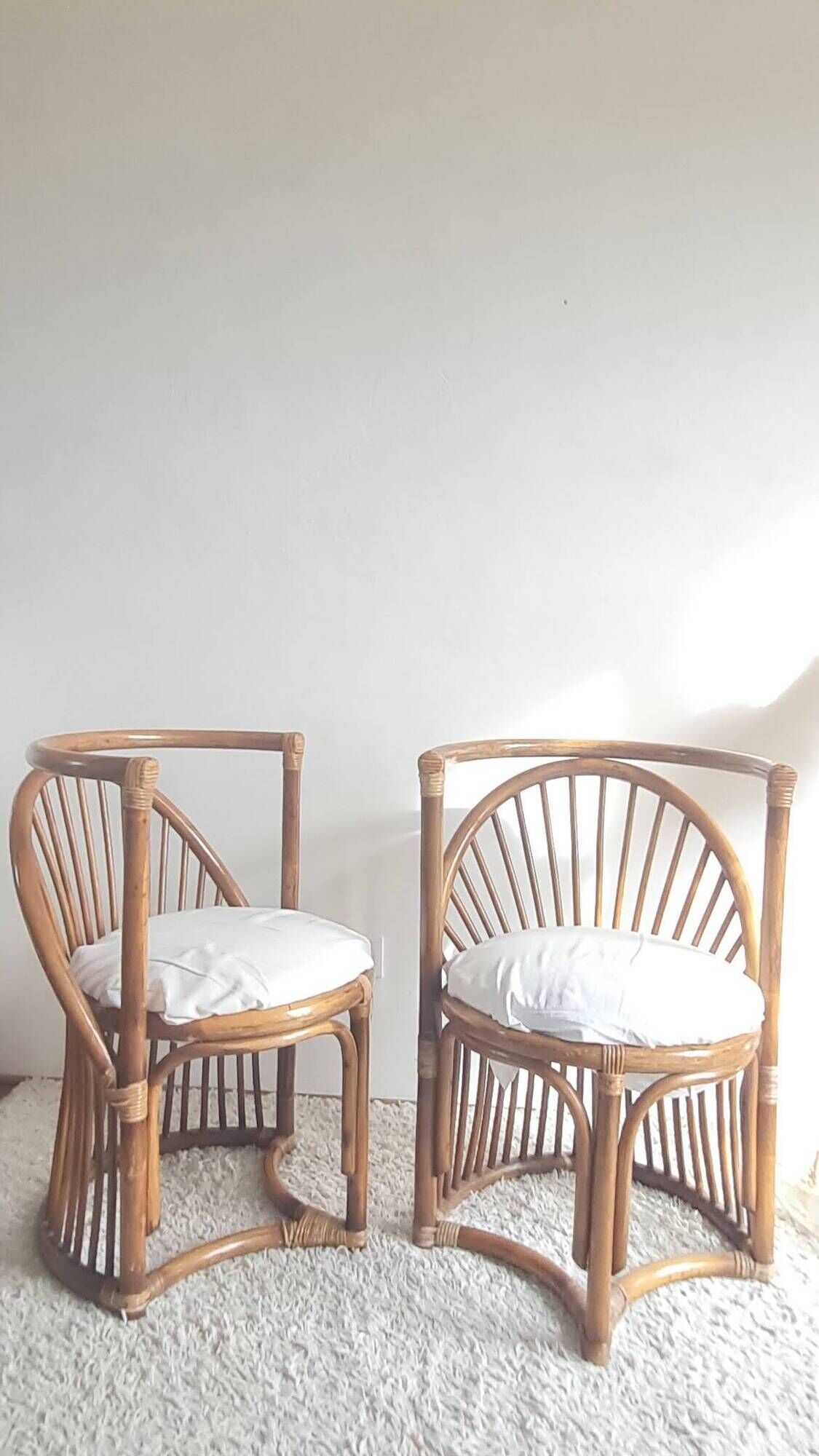 Pair of vintage rattan armchairs circa the 1960s.