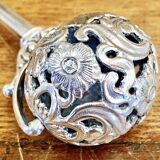Old silver bell rattle