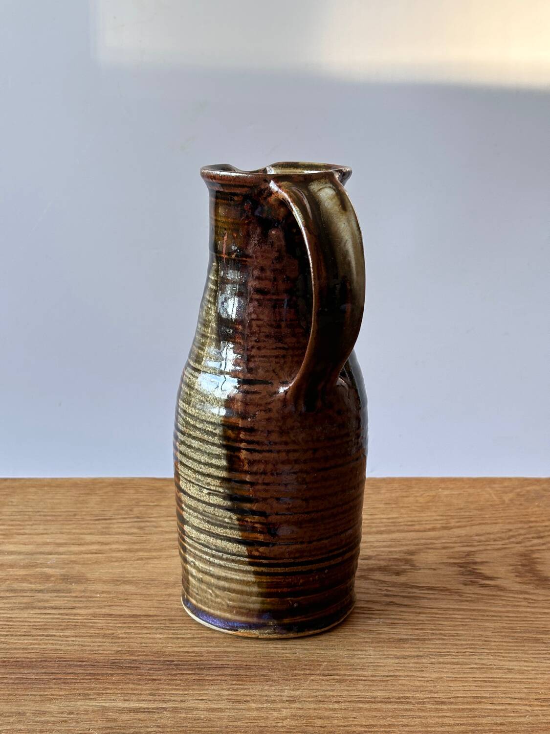 Vintage enameled stoneware pitcher