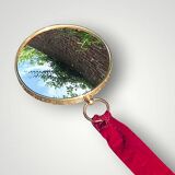 Antique hanging "witch's eye" convex mirror