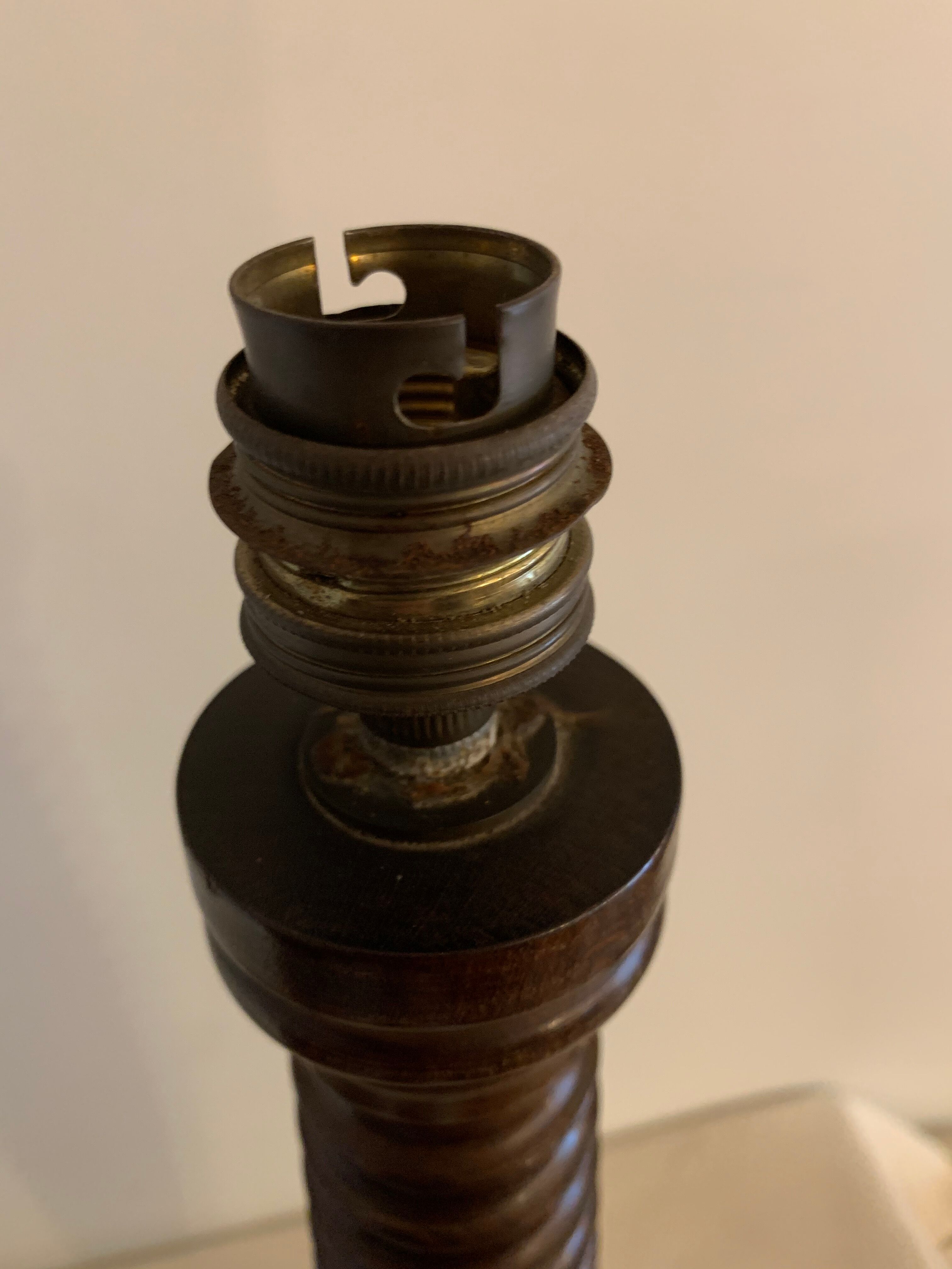 Turned wooden lamp foot in the shape of a warhead