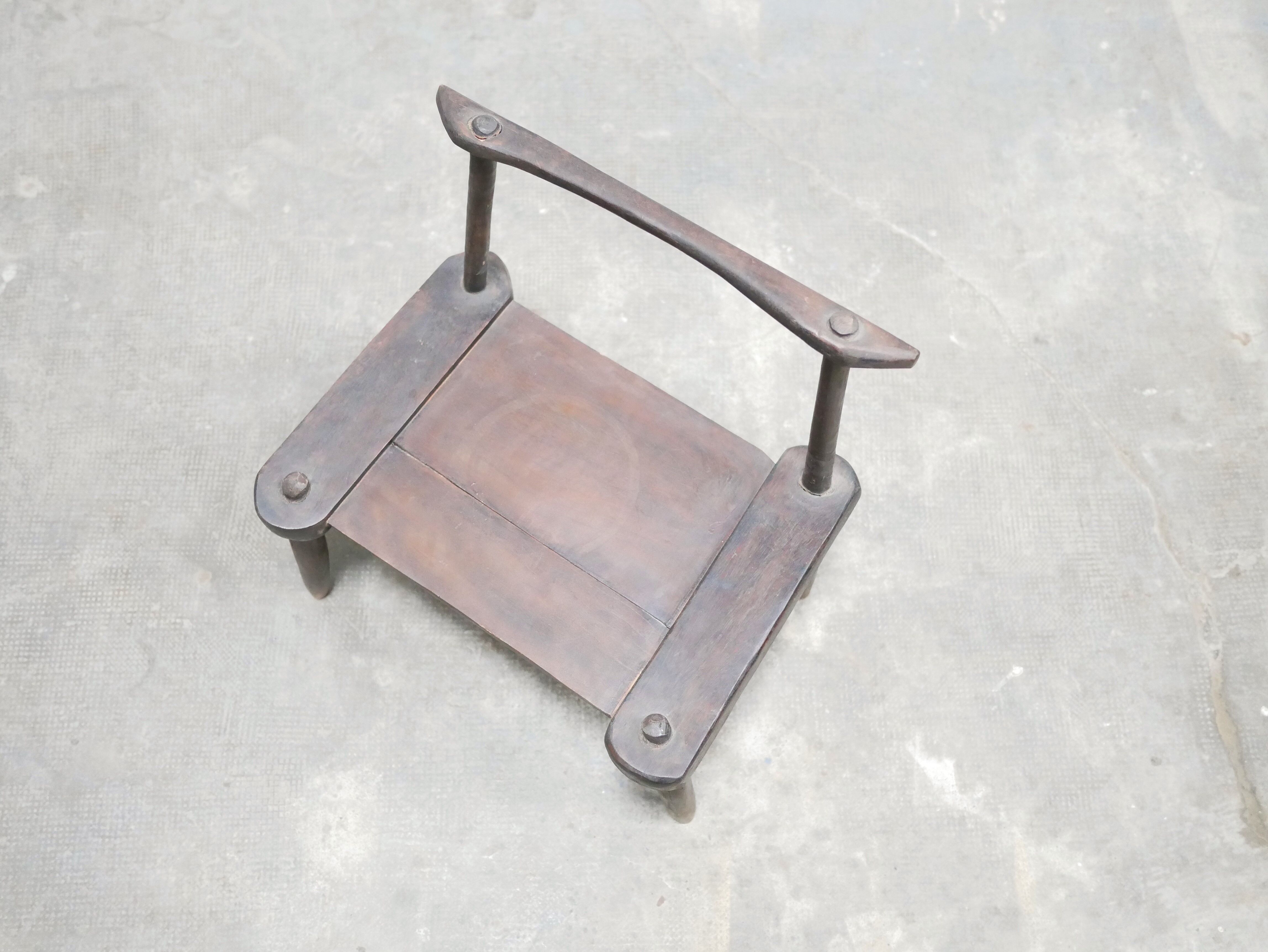Ancient brutalist African chair