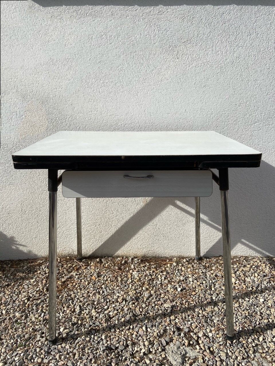 White formica table with chair