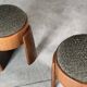 Sculptural pair of ash wood stools with dedar milano bouclé