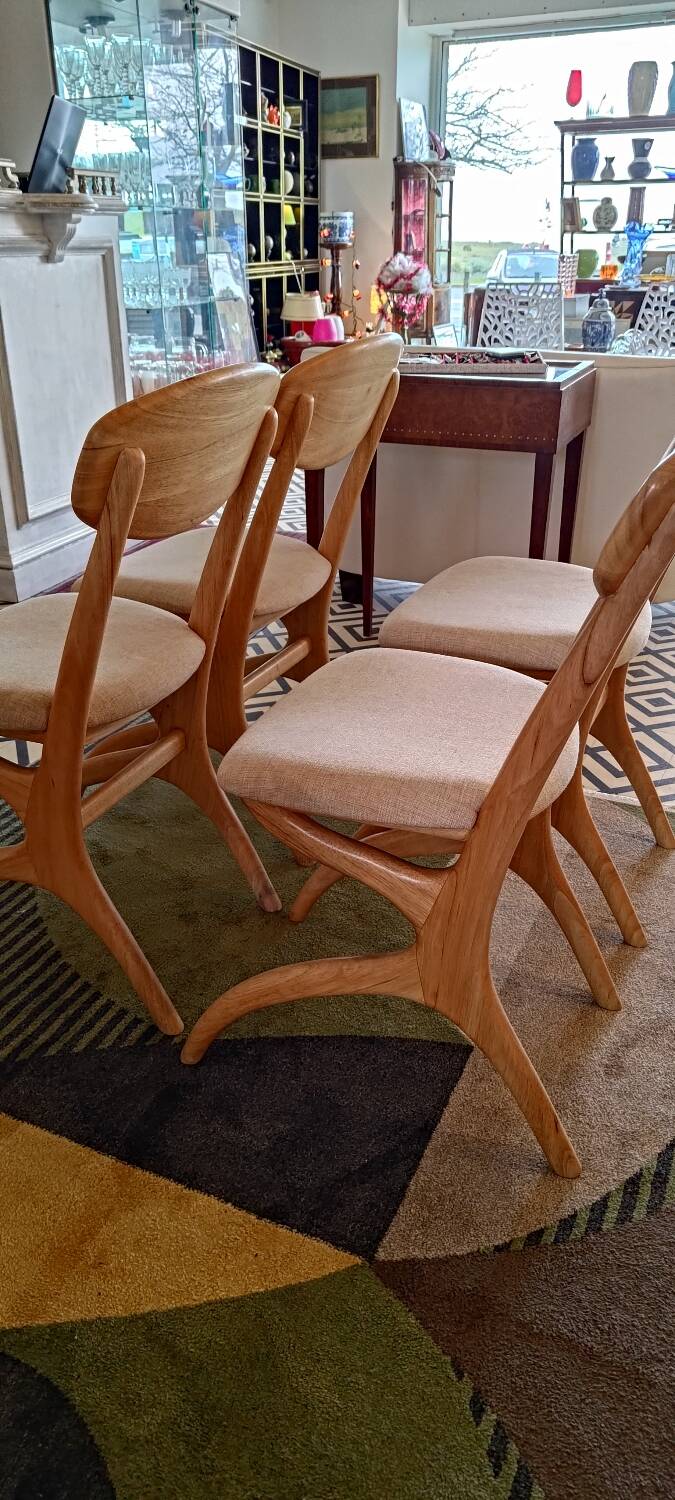 Four Scandinavian-style chairs