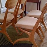 Four Scandinavian-style chairs