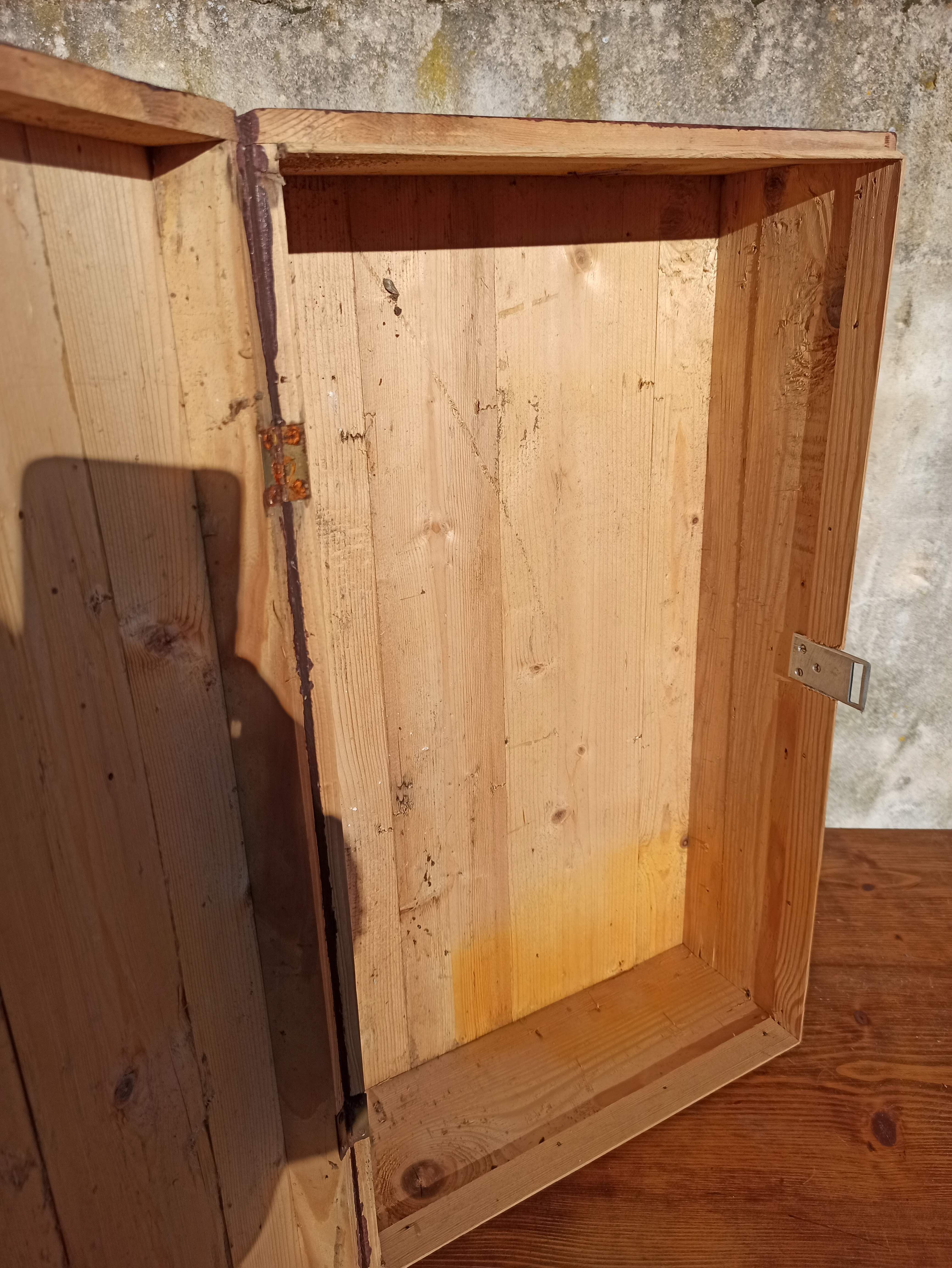 Antique wooden suitcase with lock and key
