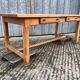 Vendée farmhouse table with cat bar and 2 drawers in solid cherry wood.