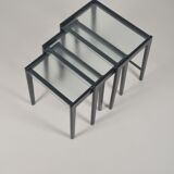 Tables gigognes en bois teinté noir et plateau en verre, années 1960