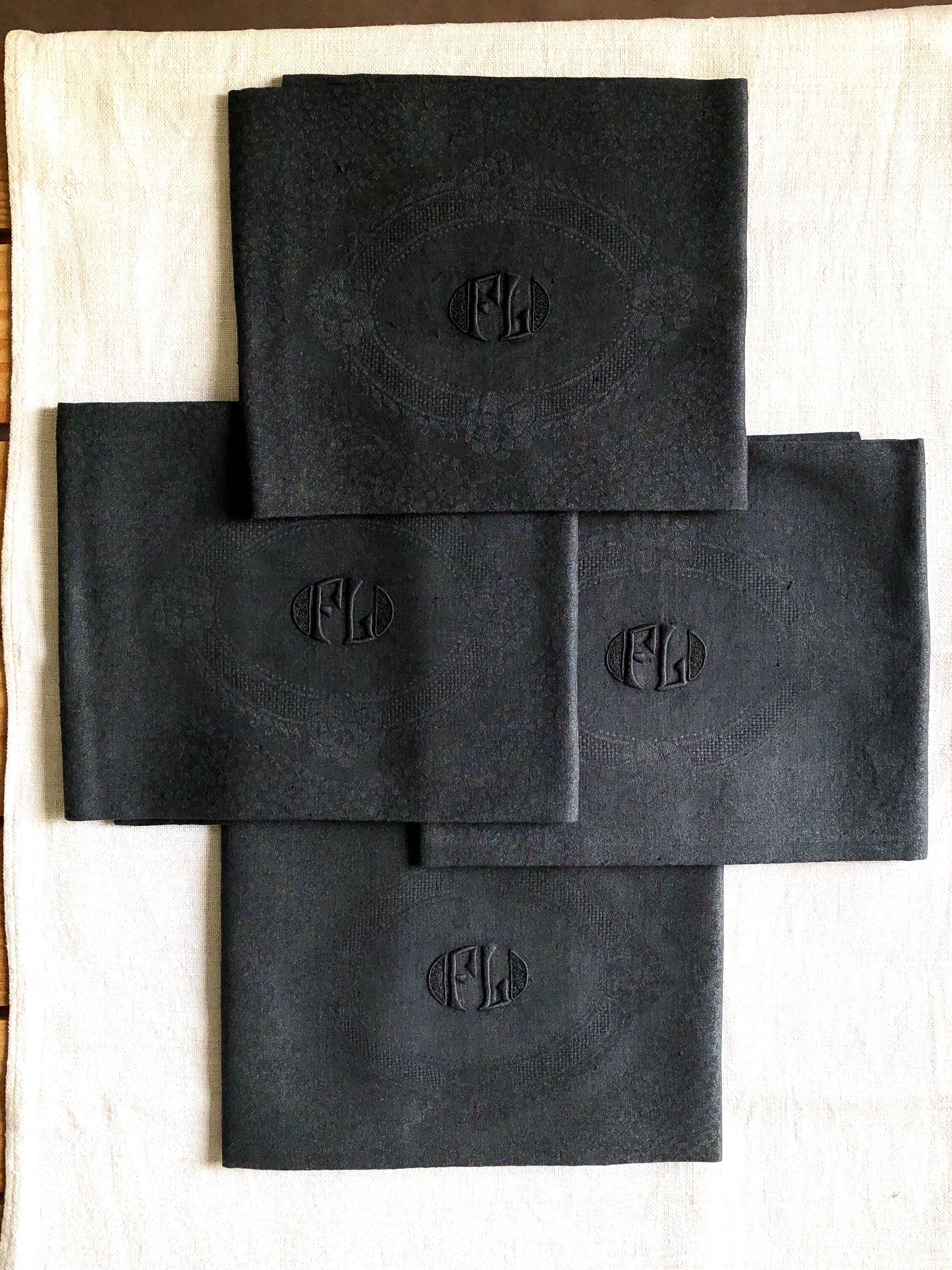 Set of four old damasked towels tinted black