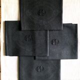 Set of four old damasked towels tinted black