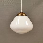 Beautiful ball-shaped hanging lamp in white opal glass with brass top.