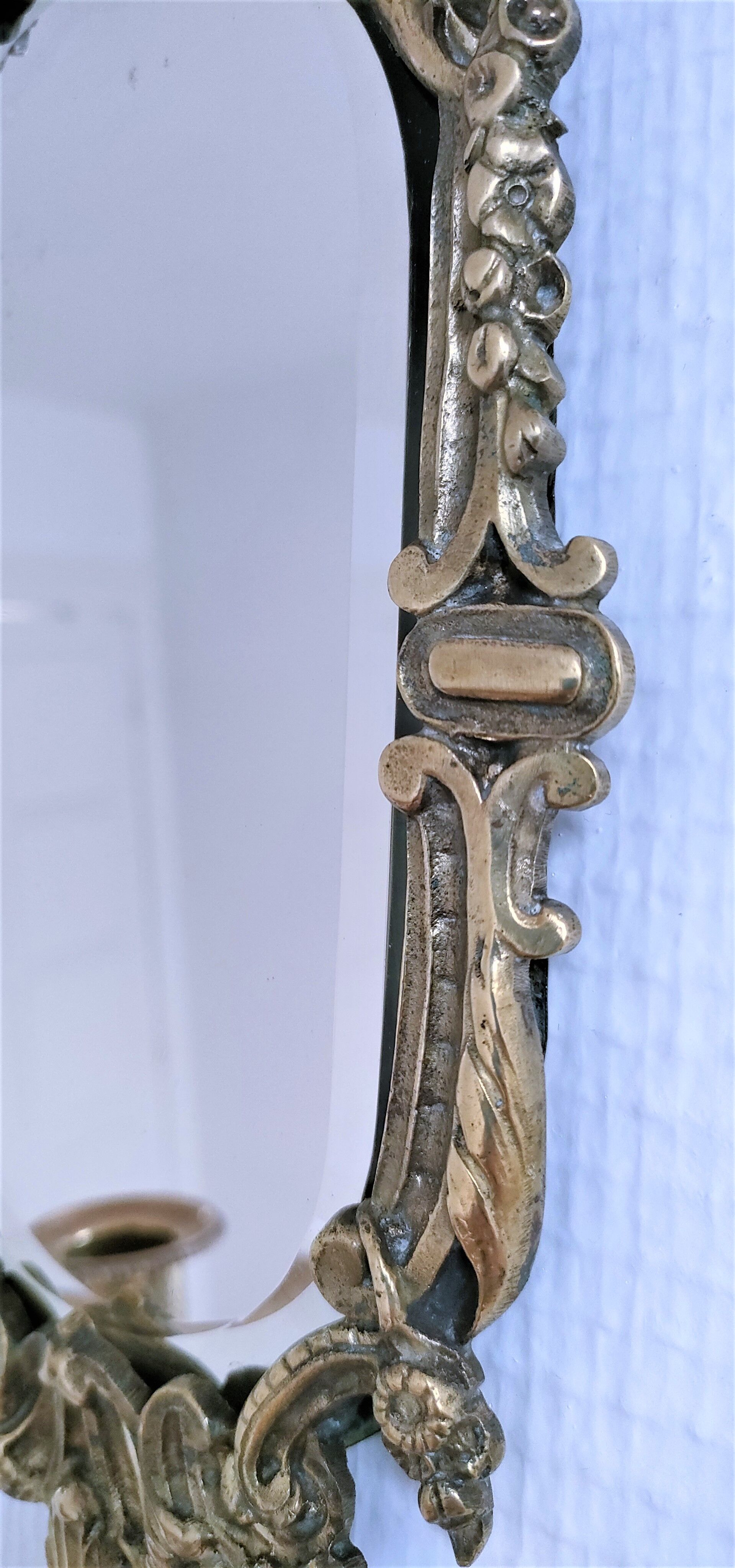 Patinated bronze chandelier mirror early twentieth century