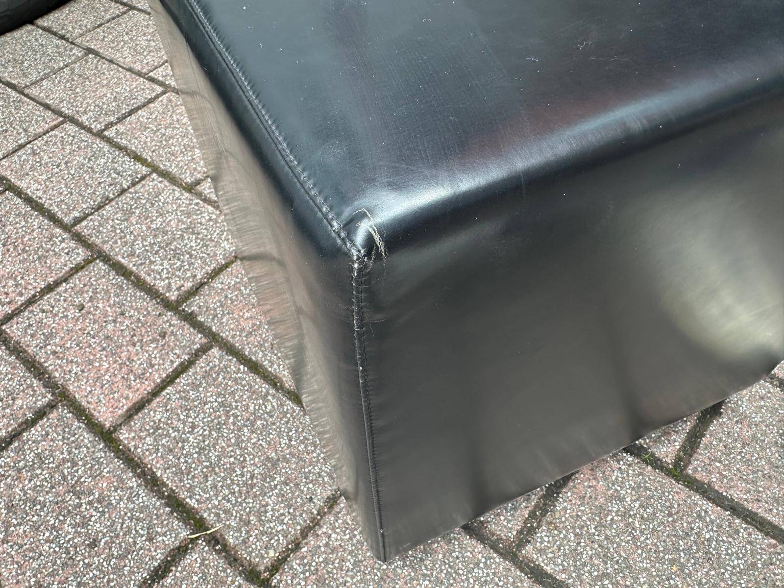Pair of designer poufs in faux leather