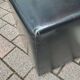 Pair of designer poufs in faux leather
