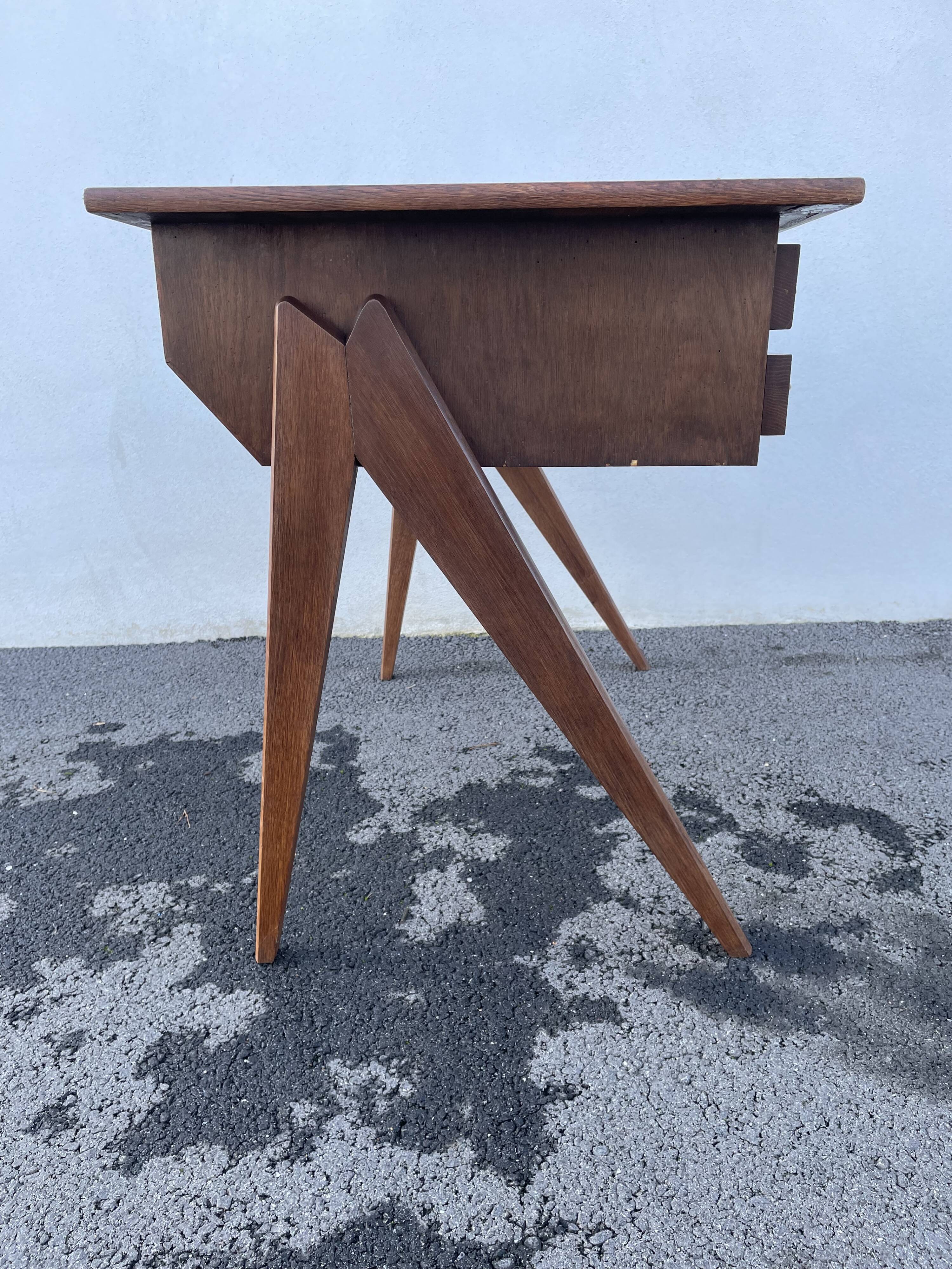 Modernist wooden desk with compass feet 1950