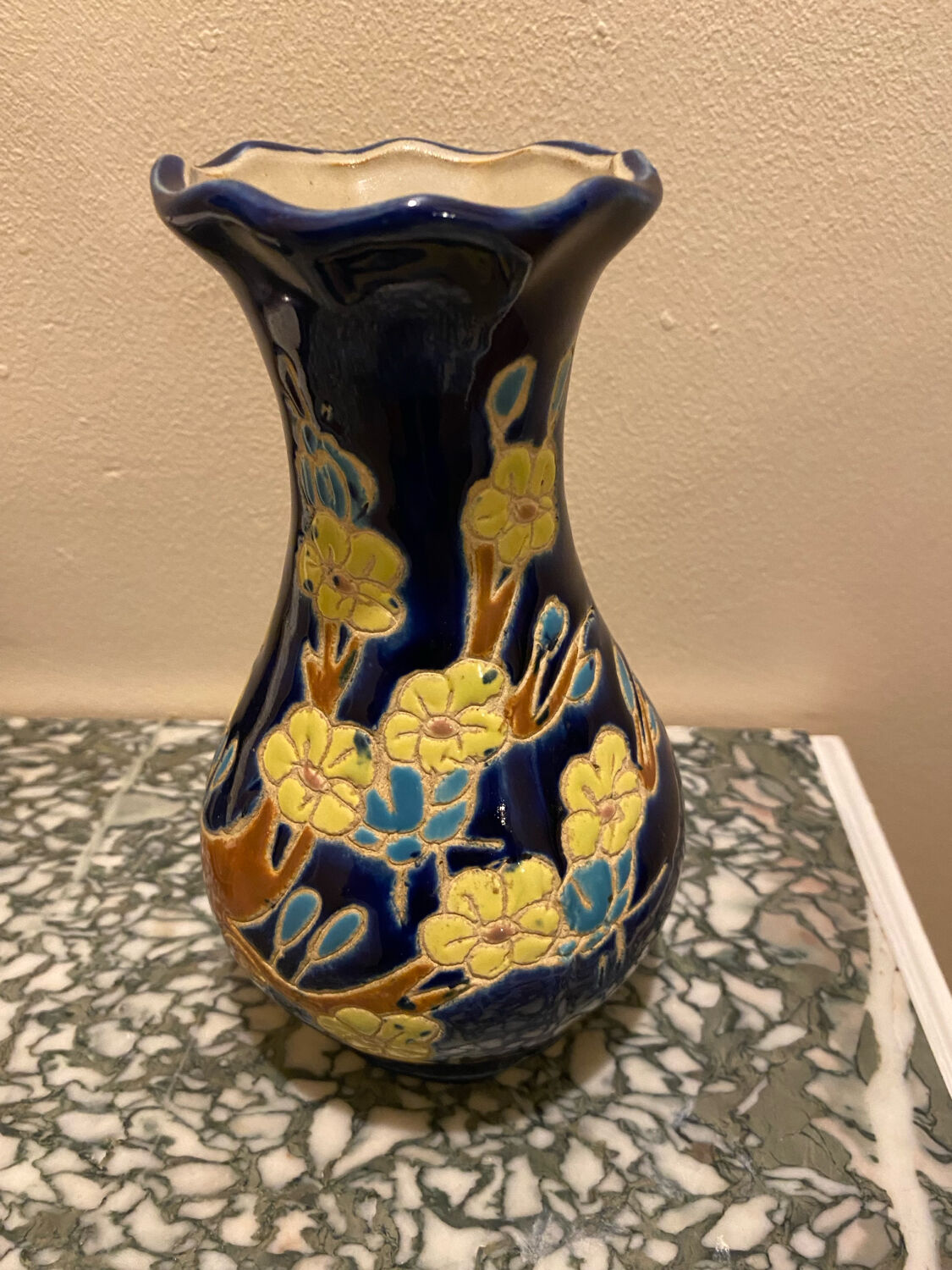 Small vase with floral patterns in the style of Longwy.