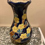 Small vase with floral patterns in the style of Longwy.