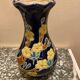 Small vase with floral patterns in the style of Longwy.