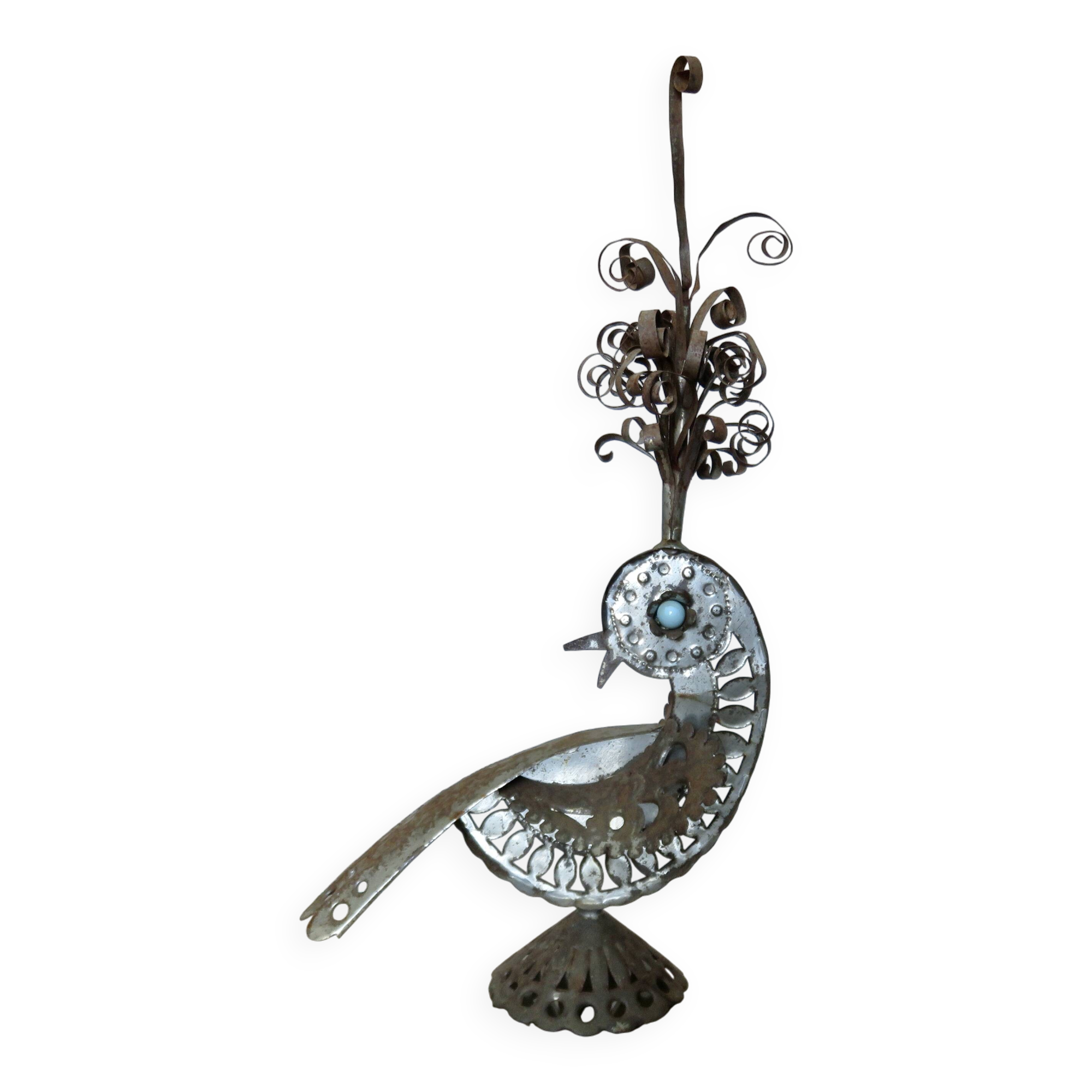 metal sculpture in sheet metal representing a peacock, work from the 1960s