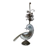 metal sculpture in sheet metal representing a peacock, work from the 1960s