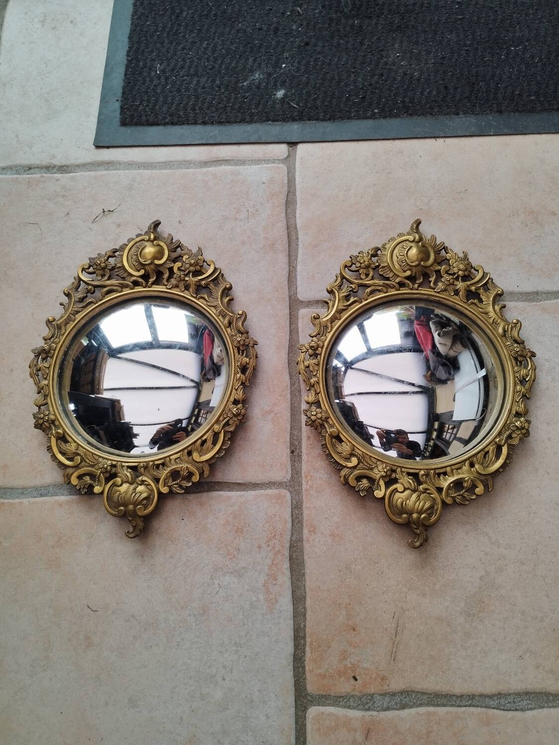 Pair of antique witch mirrors, curved glass, bronze frame