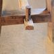 "A frame" bench in solid oak, patinated.