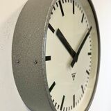 Grey industrial factory wall clock from pragotron, 1960s