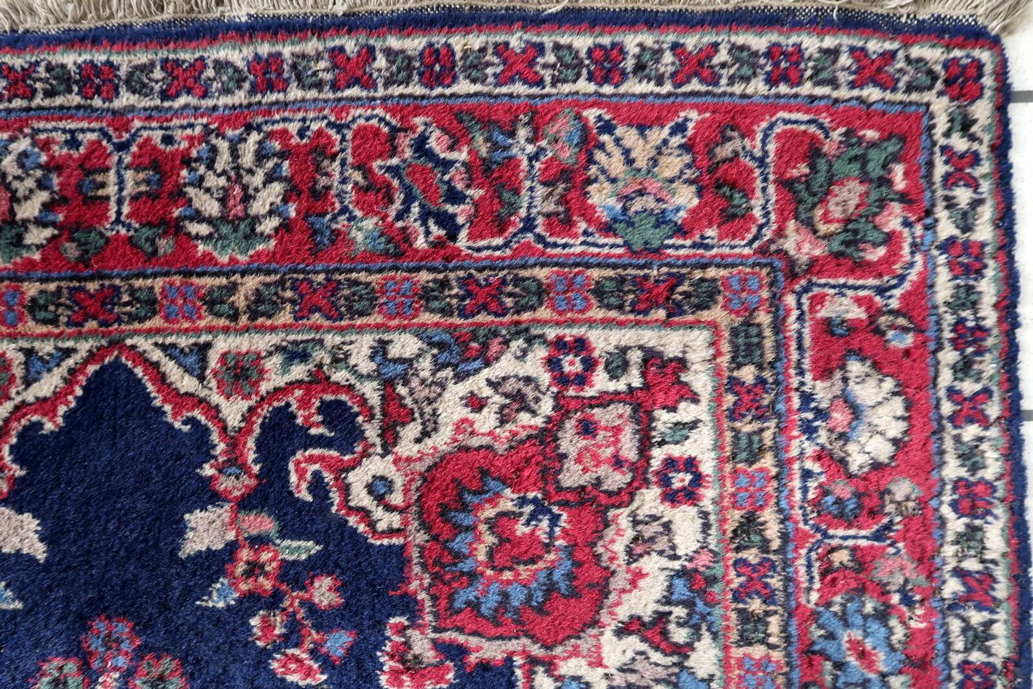 Tapis Kerman antique en laine bleue et rouge