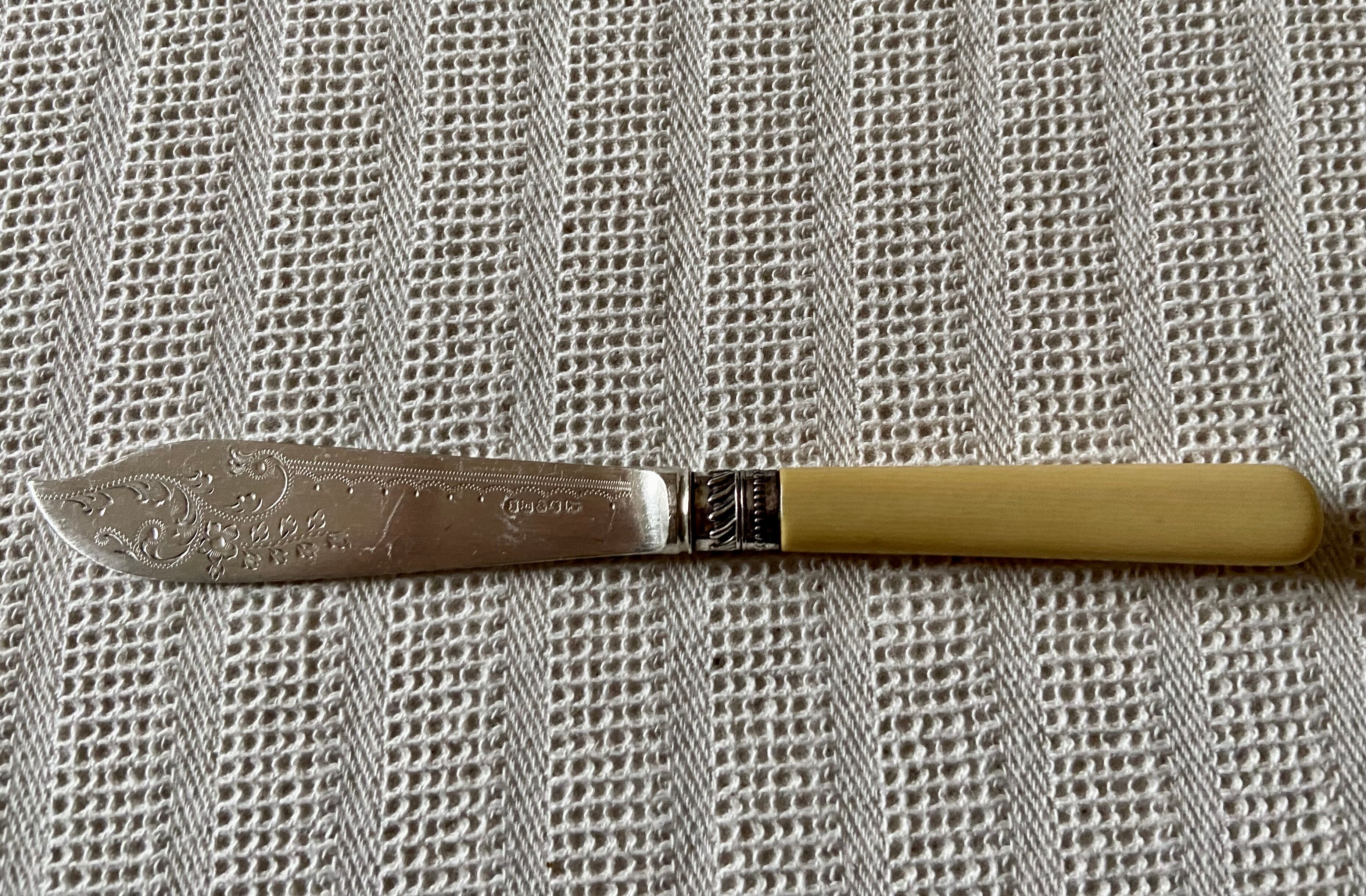 Antique silver-plated butter knife