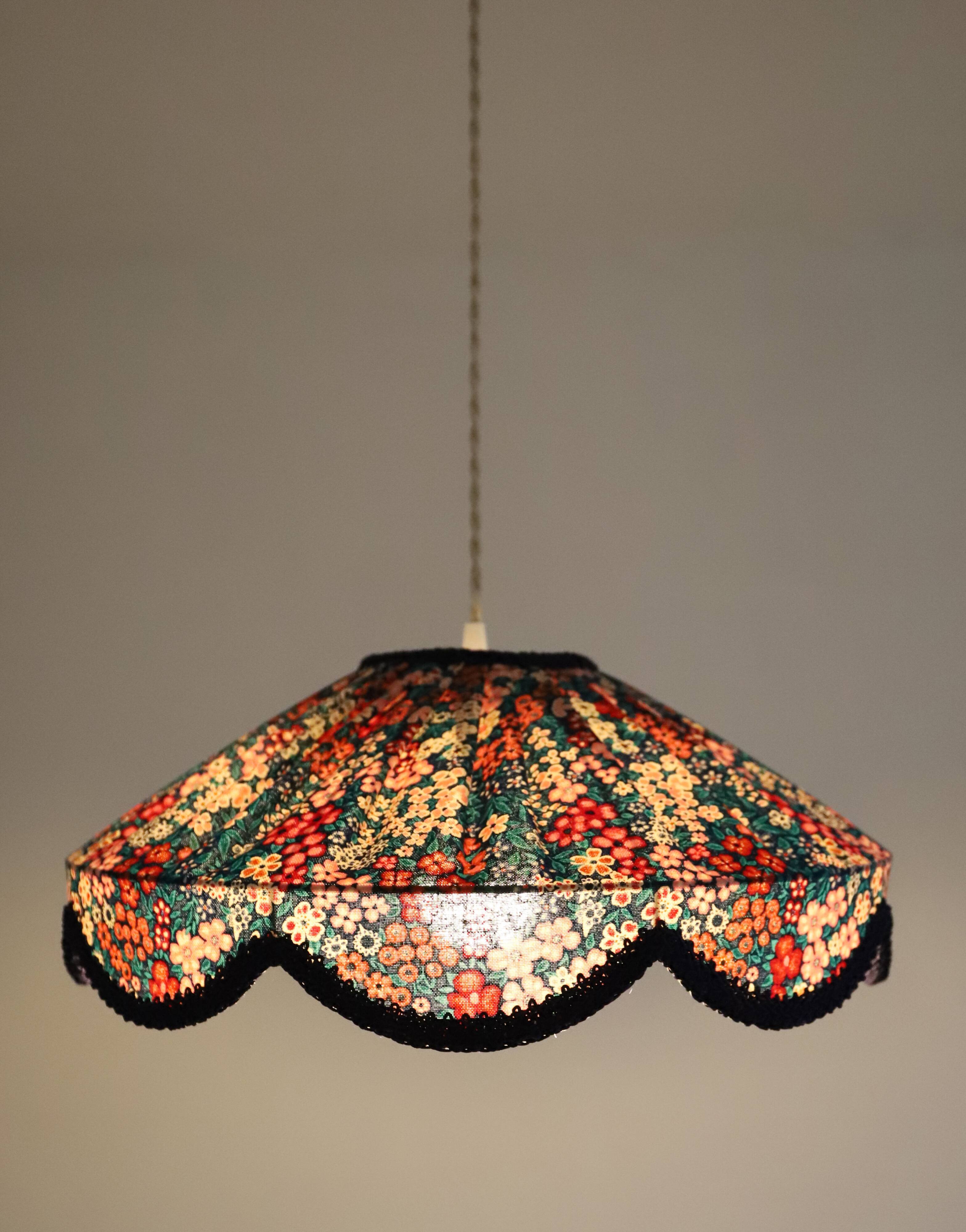 Cosette floral pendant light with "thousand flowers" print