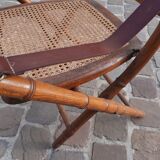 Bamboo folding chair and caning, leather and brass