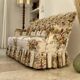 Napoleon III floral toad sofa with boudoir spirit and sliced backrest.