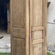 Eighteenth-century Parisian armoire with one bonnetière door in raw wood.
