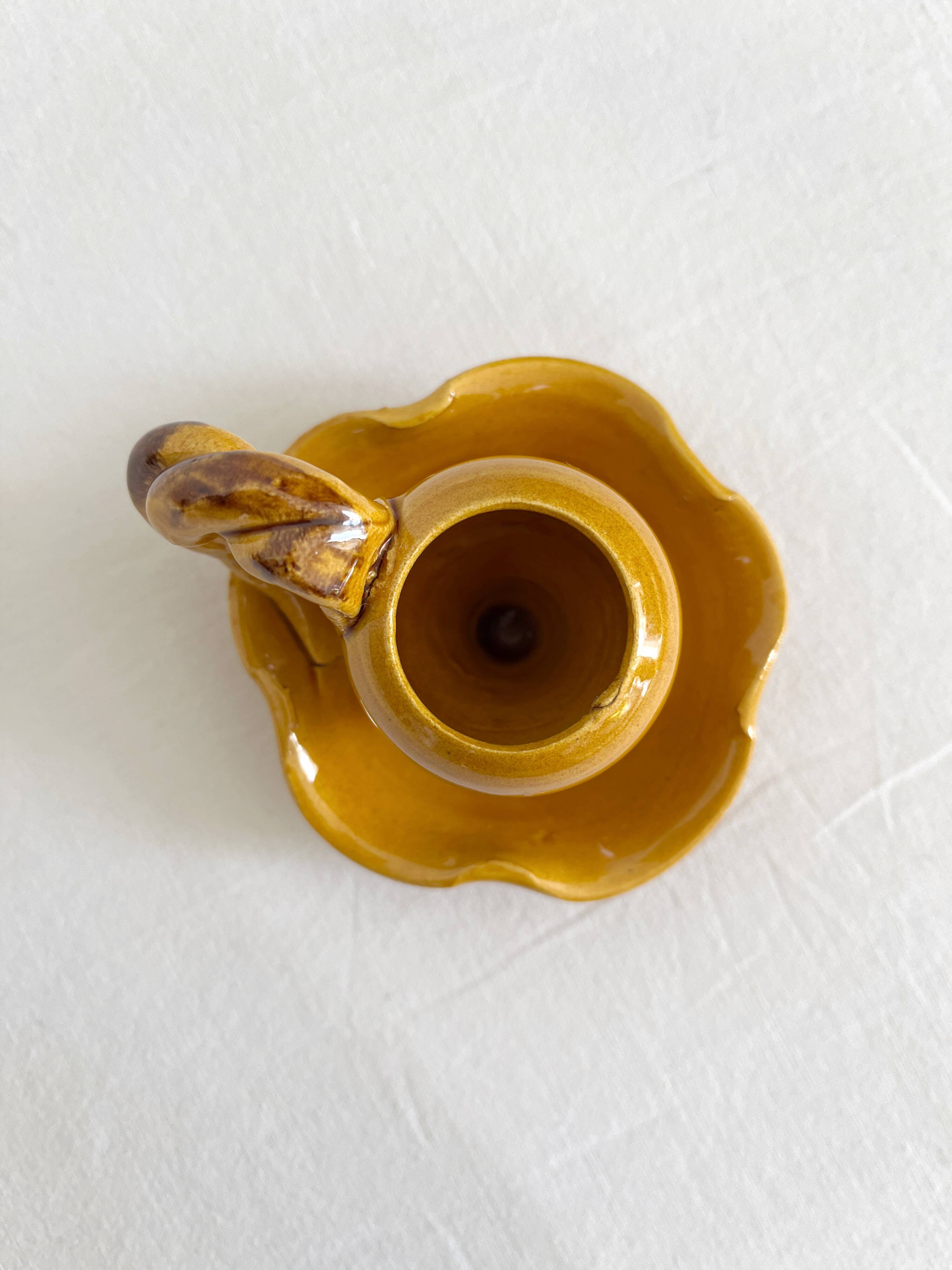 Mustard ceramic candle holder with vintage twisted handle