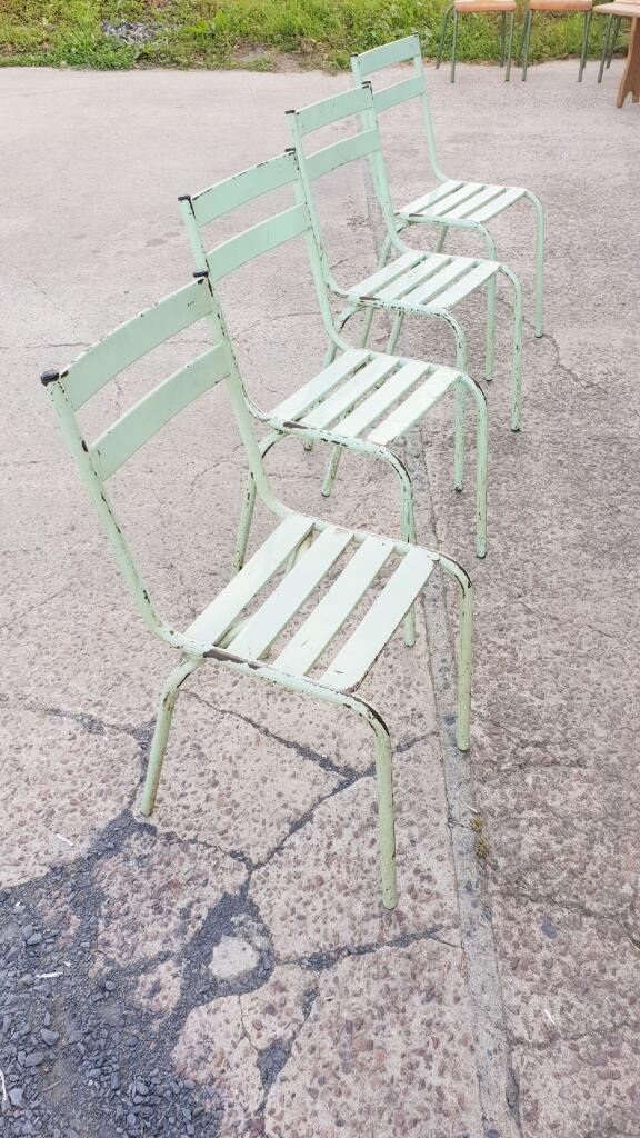 Four vintage metal chairs
