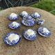 Coffee service composed of 17 pieces, in blue and white porcelain, cherry blossom patterns