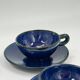 Set of 4 vintage ceramic cups and saucers, cobalt blue glaze.