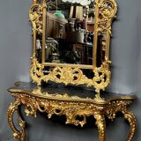 Mirror set with baroque style gilded wood console on marble top.
