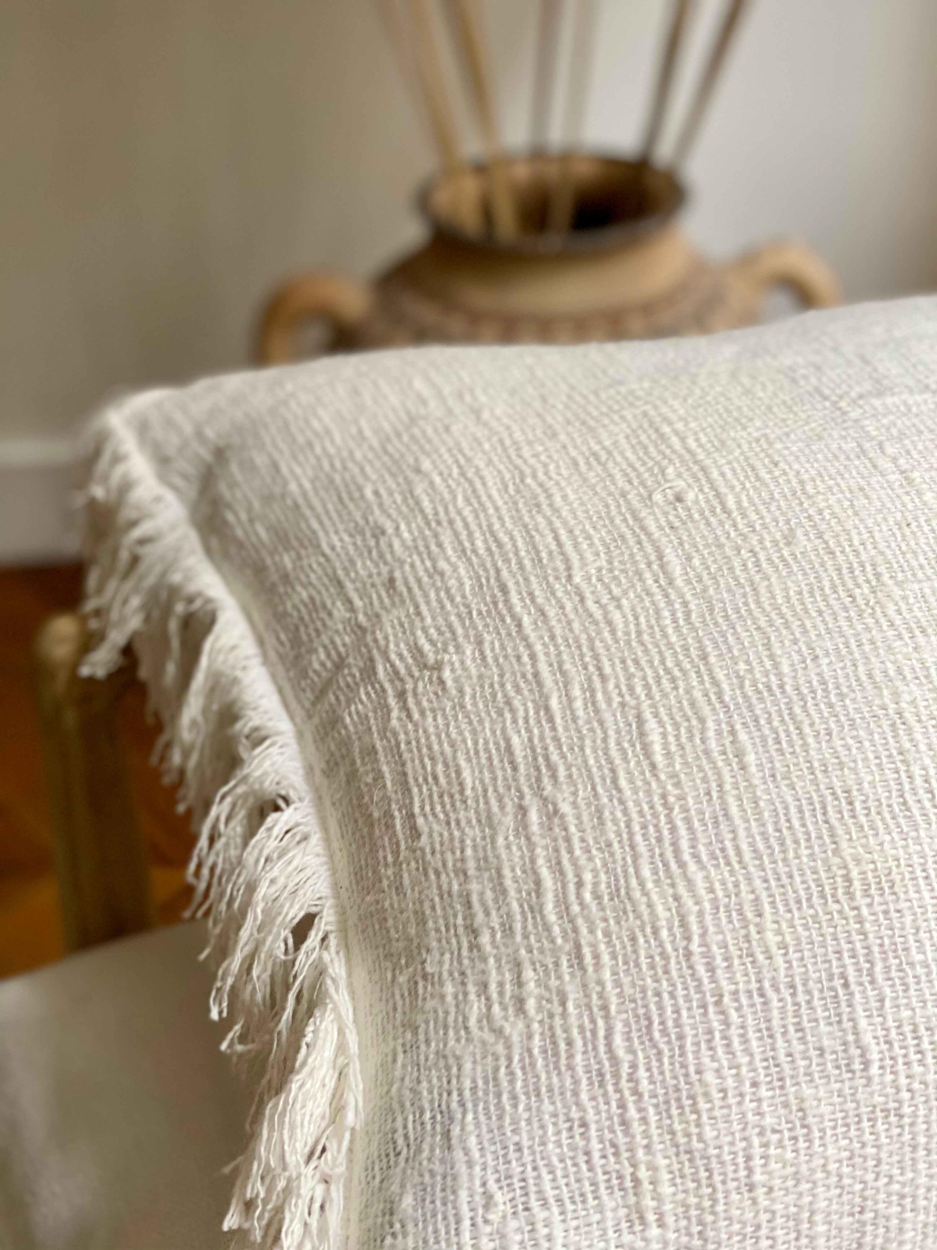 White linen bohemian cushion fringed