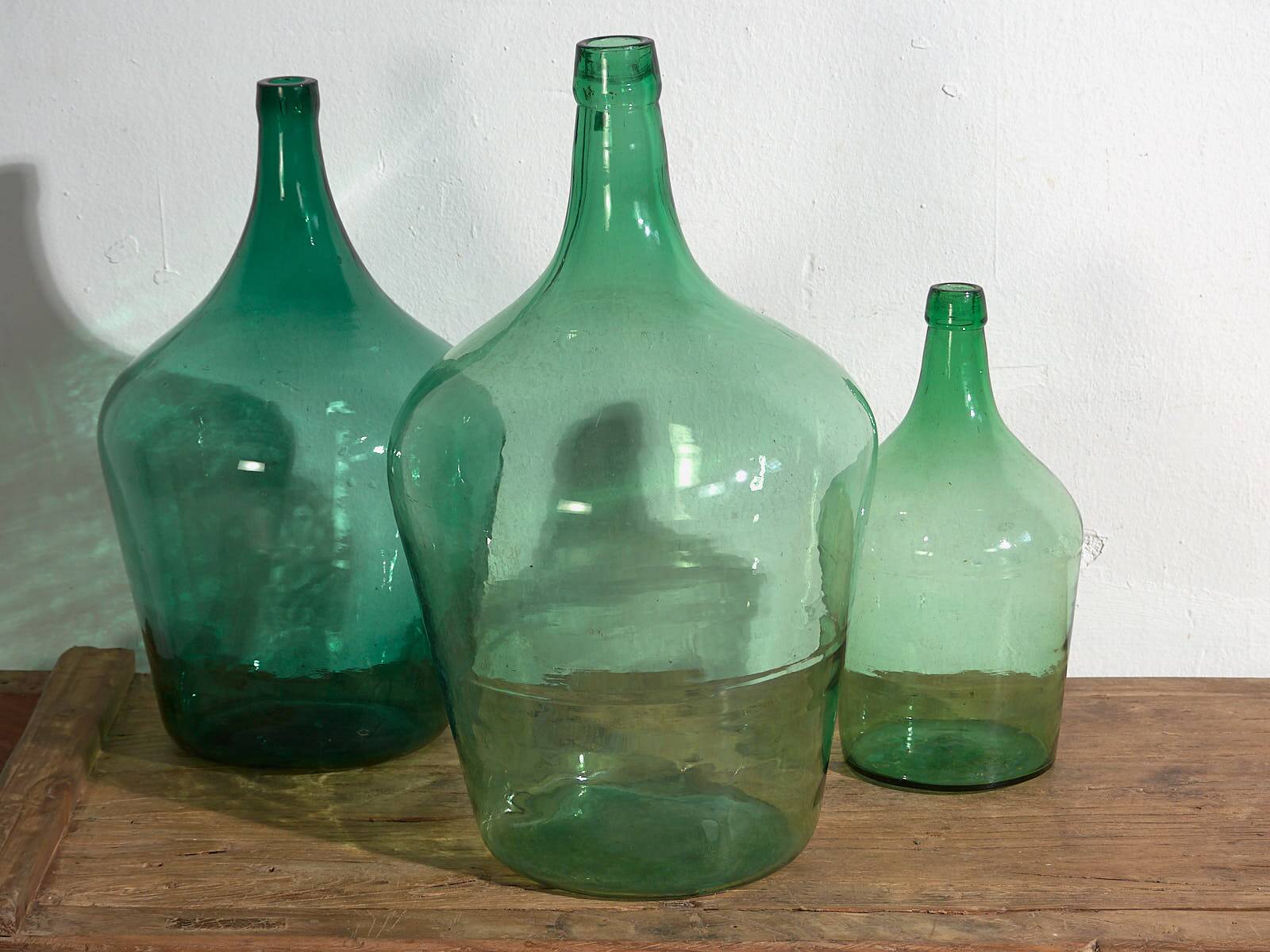 Antique green demijohns (c.1920). 3-piece set #6