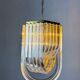 Long mid-century curved Lucite ribbon chandelier in brass, Italy