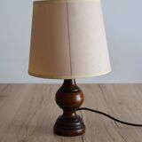 Vintage table lamp in turned wood and fabric lampshade
